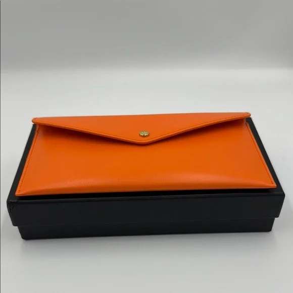 MCM Vibrant Orange Leather Clutch
